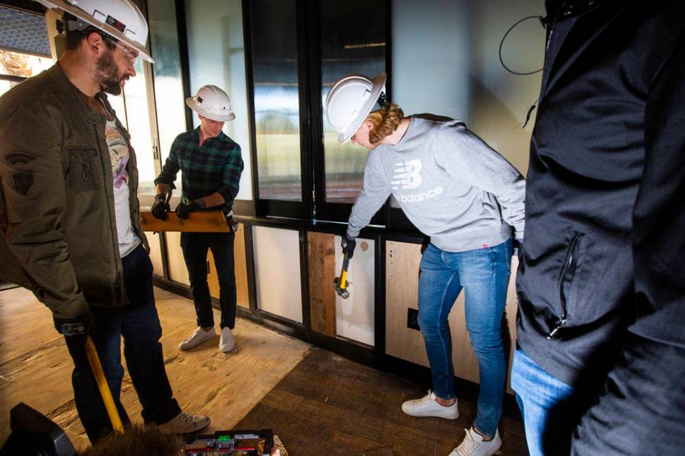 Golden Knights players, from left, Deryk Engelland, Reilly Smith, William Karlsson and Alex Tuc ...