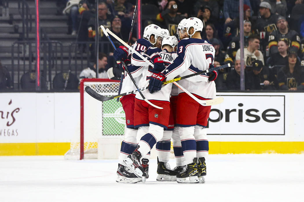 The Columbus Blue Jackets celebrate a goal against the Golden Knights during the first period o ...