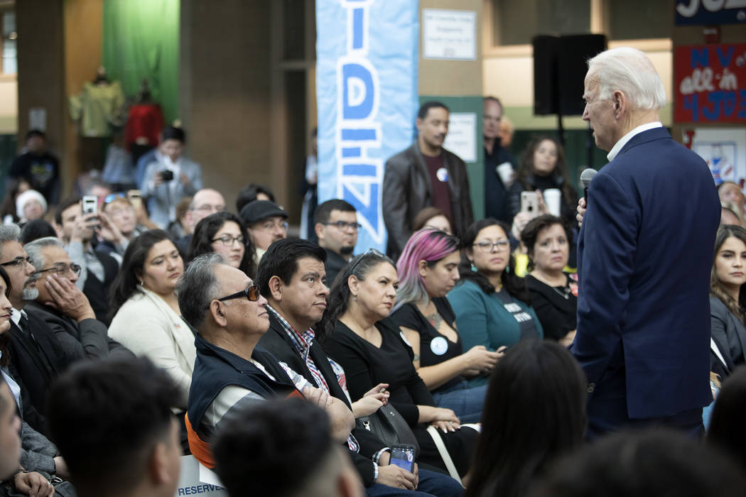 The audience listens as presidential candidate Joe Biden delivers his message at a campaign eve ...