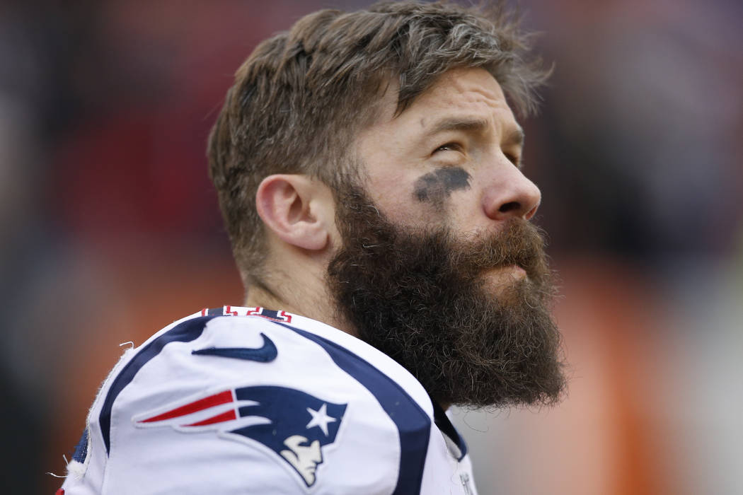 FILE - In this Dec. 15, 2019 file photo, New England Patriots wide receiver Julian Edelman stan ...