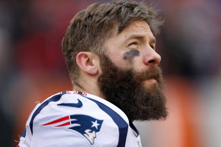 FILE - In this Dec. 15, 2019 file photo, New England Patriots wide receiver Julian Edelman stan ...