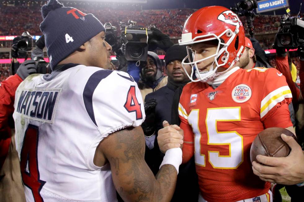 Kansas City Chiefs quarterback Patrick Mahomes, right, and Houston Texans quarterback Deshaun W ...