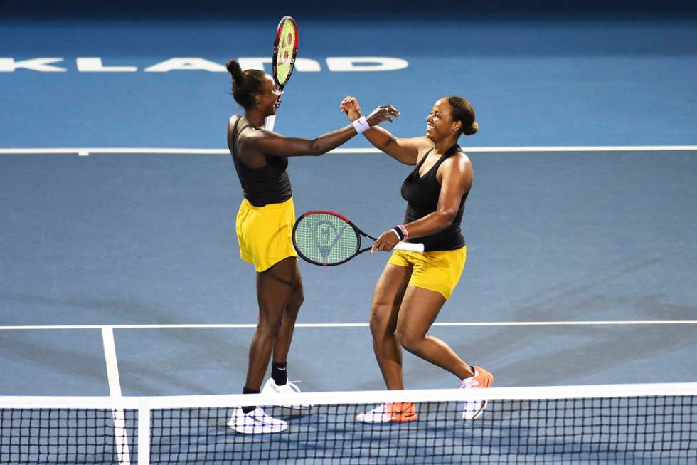 United States player Asia Muhammad, left, and Taylor Townsend from the United States celebrates ...