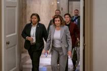 Speaker of the House Nancy Pelosi, D-Calif., arrives at the Capitol in Washington, Friday, Jan. ...
