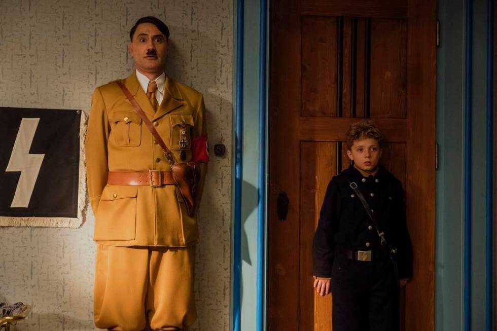 This image released by Fox Searchlight Pictures shows Taika Waititi, left, and Roman Griffin Da ...