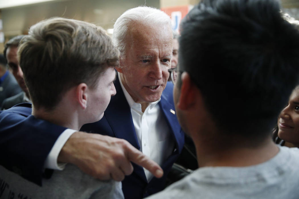 Former Vice President and Democratic presidential candidate Joe Biden meets with attendees at a ...