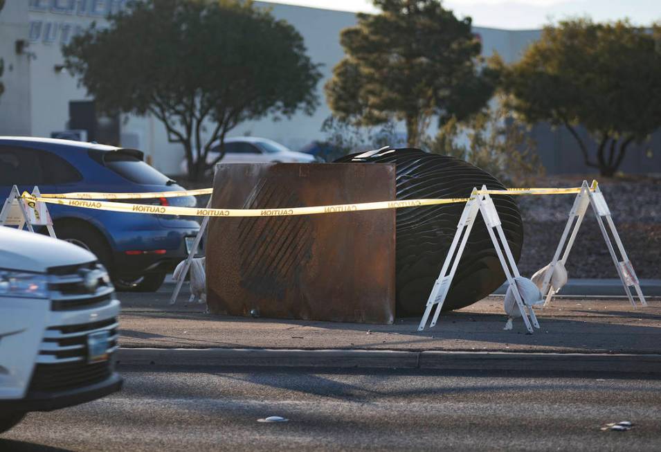 An SUV crashed into and knocked over one of two "Norte Y Sur" steel head sculptures in the medi ...