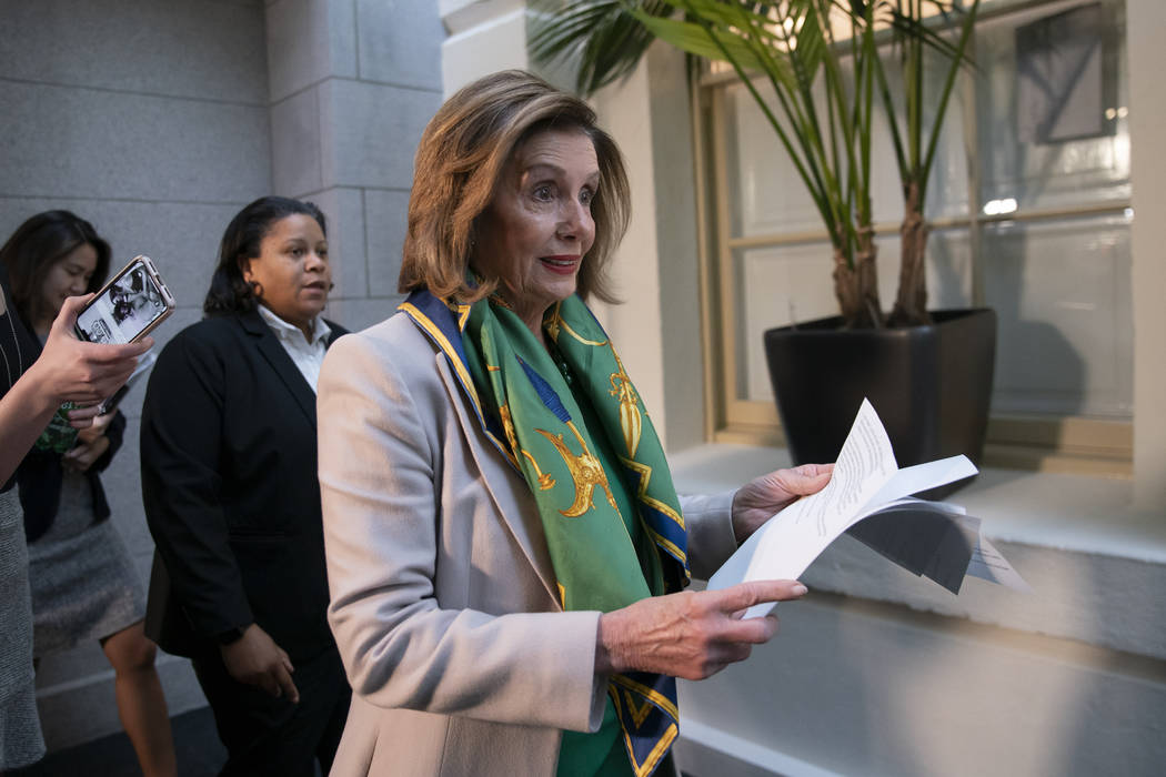 Speaker of the House Nancy Pelosi, D-Calif., arrives to meet with the Democratic Caucus at the ...