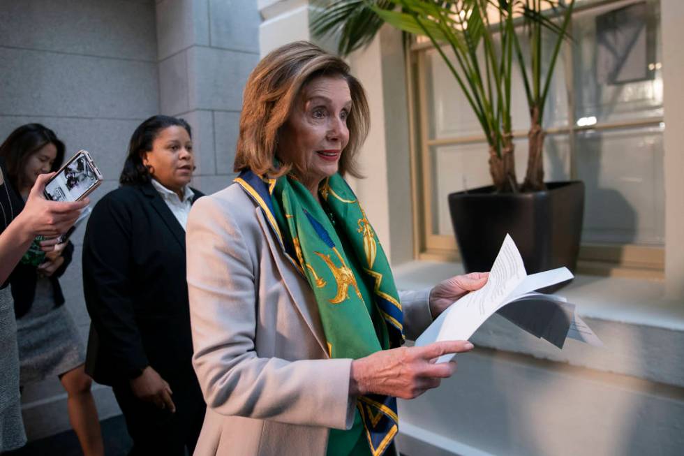 Speaker of the House Nancy Pelosi, D-Calif., arrives to meet with the Democratic Caucus at the ...