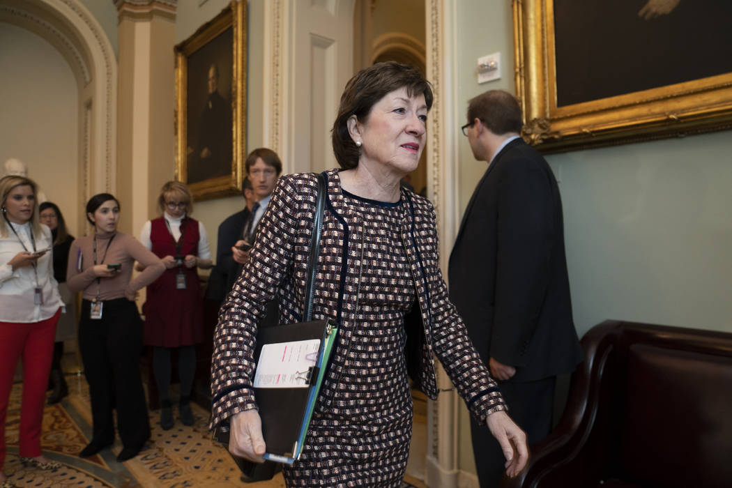 Sen. Susan Collins, R-Maine, arrives for a closed meeting with fellow Republicans about the loo ...