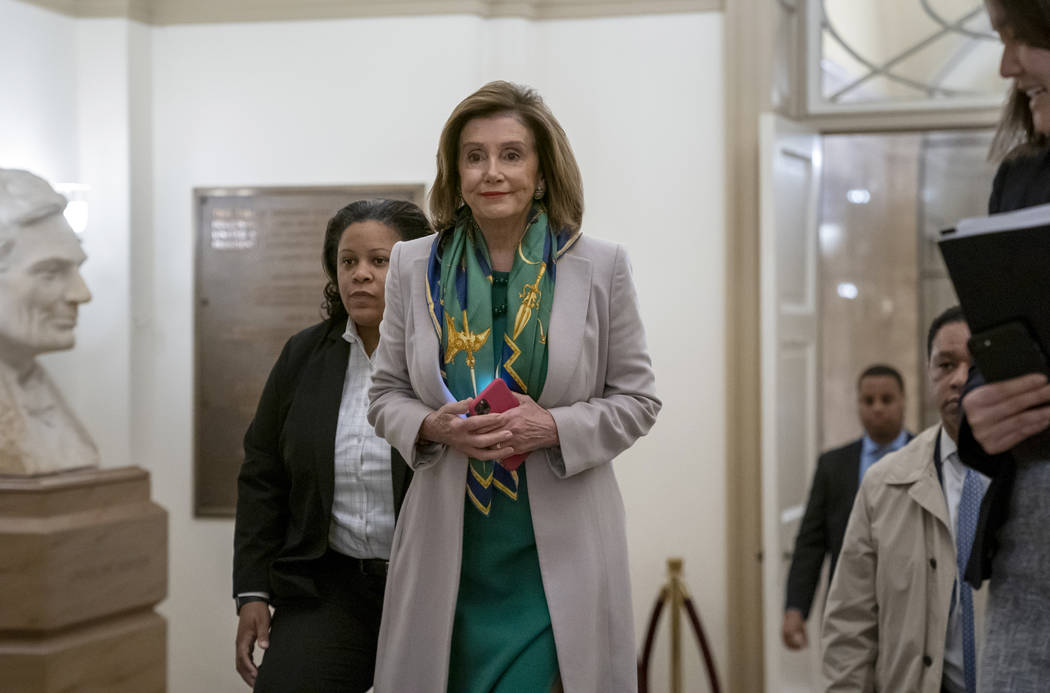 Speaker of the House Nancy Pelosi, D-Calif., arrives to meet with the Democratic Caucus at the ...