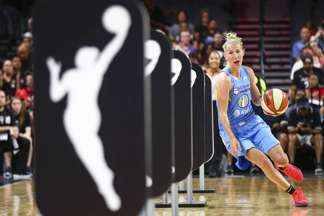 Chicago Sky's Courtney Vandersloot competes in an obstacle course involving passing and shootin ...