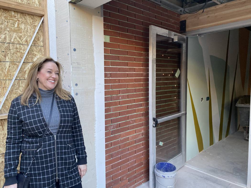 Kim Owens stands on what will be the patio of Main St. Provisions. (Al Mancini/Las Vegas Review ...