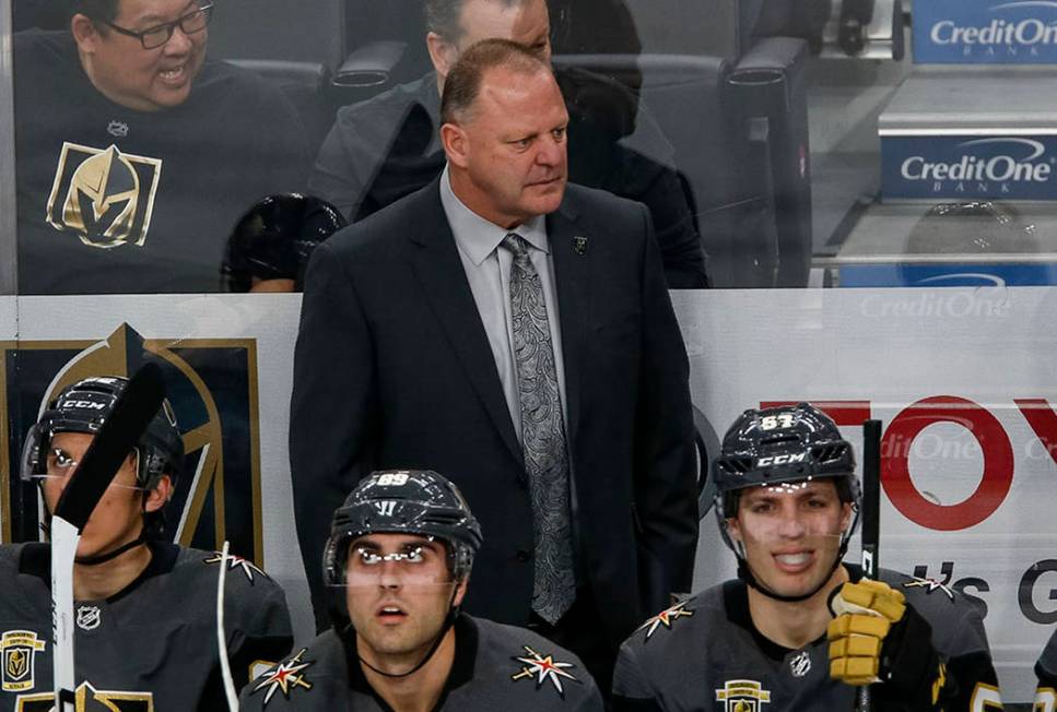 Vegas Golden Knights head coach Gerard Gallant watches his team as play continues during the fi ...