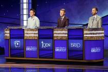From left, James Holzhauer, Ken Jennings and Brad Rutter appear on the set of "Jeopardy! The Gr ...
