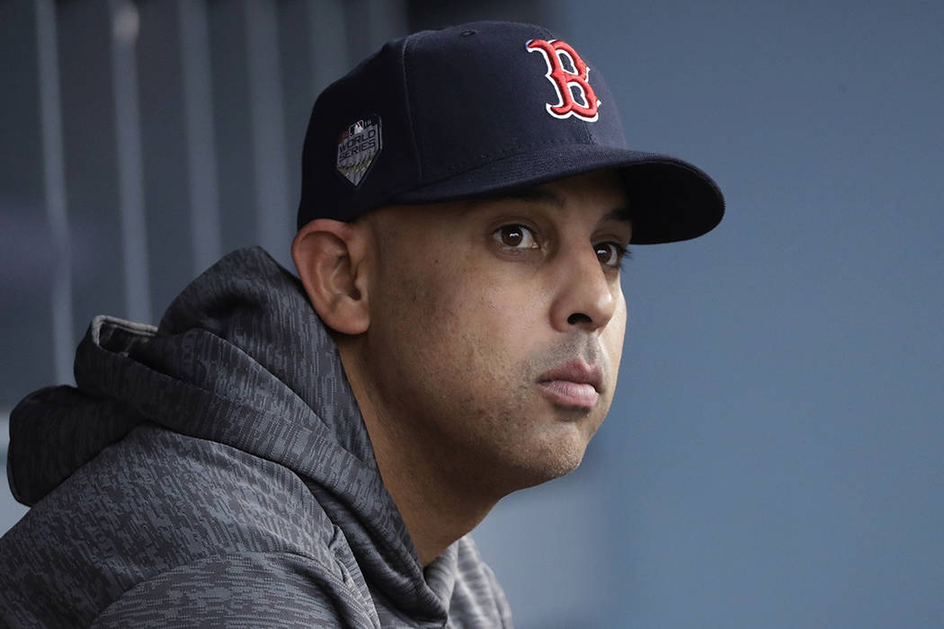 FILE - In this Oct. 28, 2018, file photo, Boston Red Sox manager Alex Cora waits for the start ...