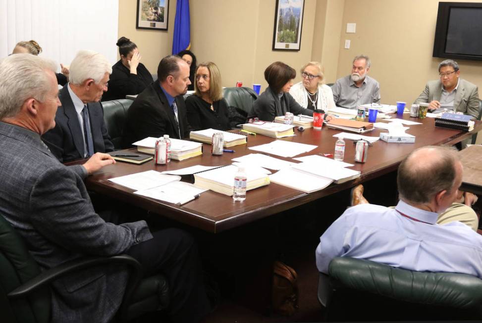 Nevada Board of Dental Examiners members, including David Lee, the new secretary-treasurer, far ...