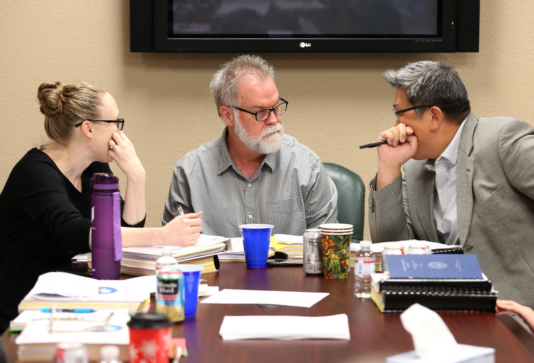 Rosalie Bordelove, left, deputy attorney general, Daniel Kevin Moore, the new president of the ...