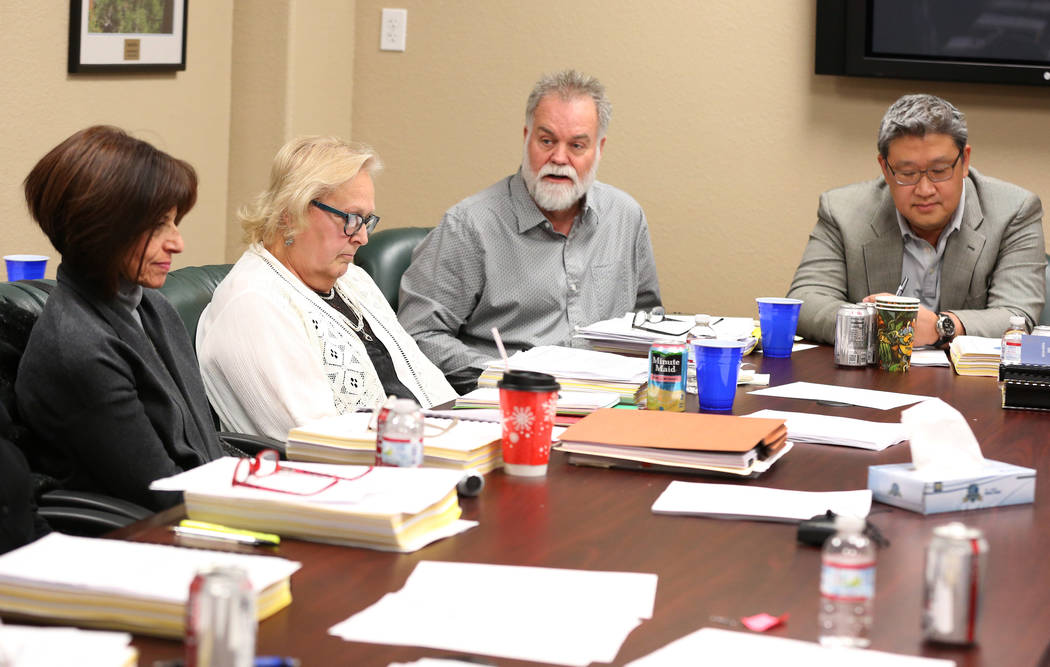 Nevada Board of Dental Examiners members, including David Lee, the new secretary-treasurer, rig ...