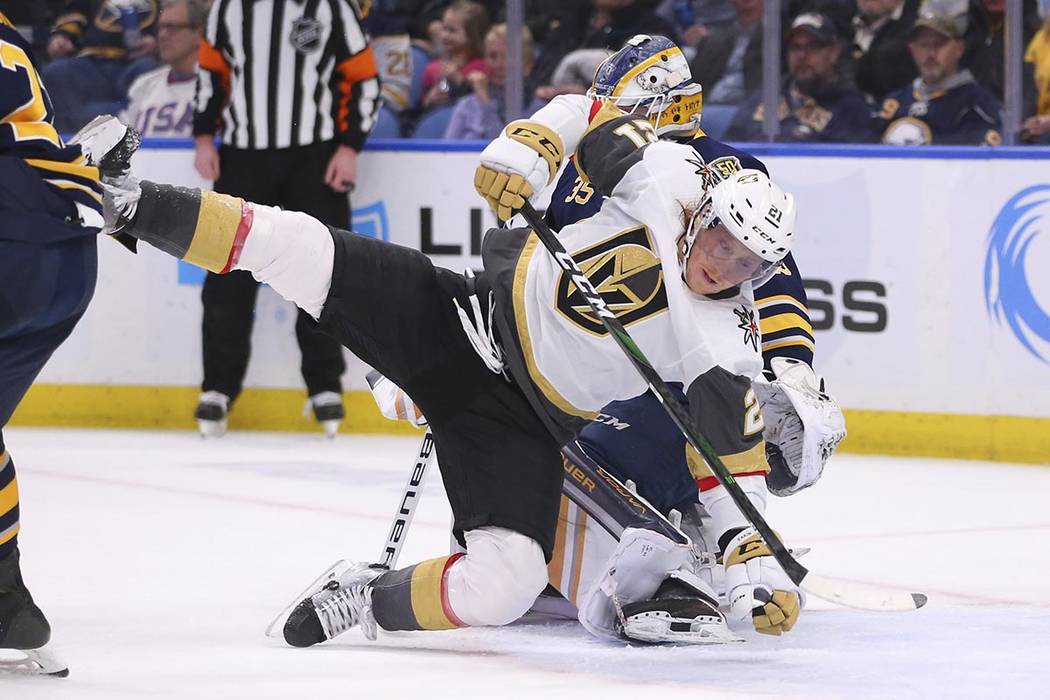 Buffalo Sabres goalie Linus Ullmark (35) brings down Vegas Golden Knights forward Cody Eakin (2 ...