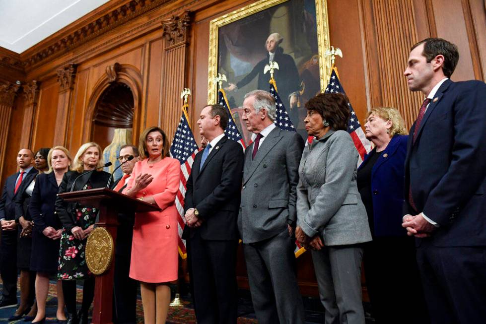 Speaker of the House Nancy Pelosi, D-Calif., speaks during an engrossment ceremony to sign the ...