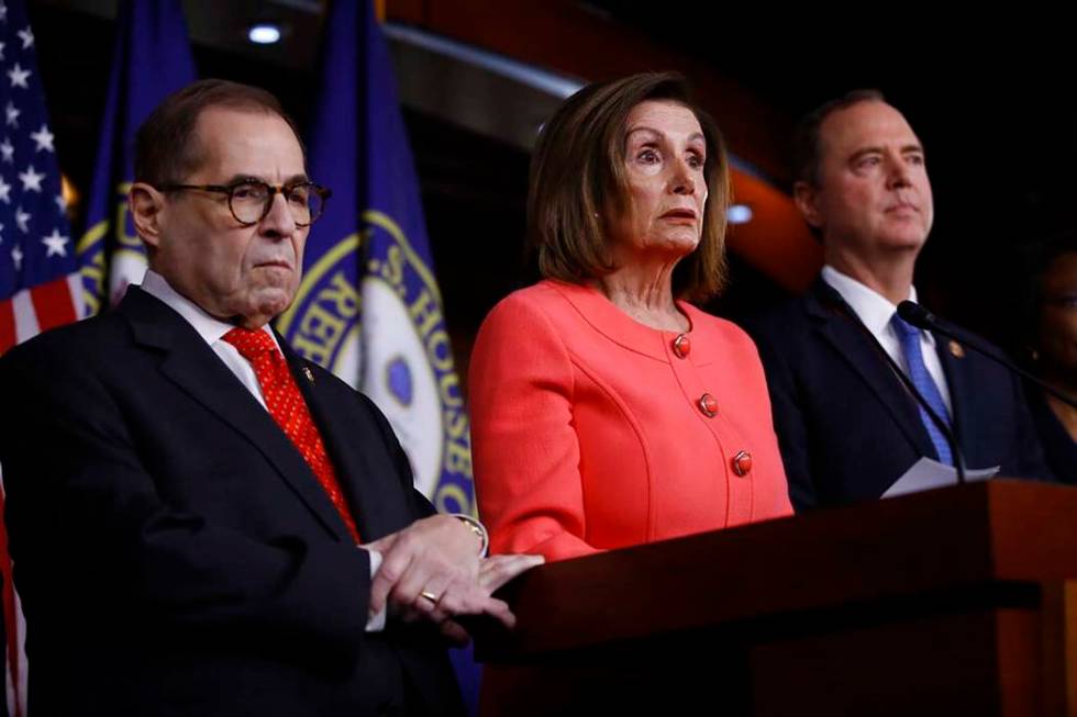 House Speaker Nancy Pelosi of Calif., speaks during a news conference to announce impeachment m ...