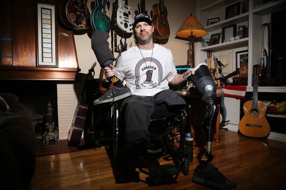 Scott Booth, a former pilot for Papillon Grand Canyon Helicopters, at his parents' home in Long ...