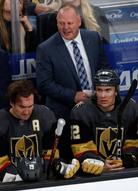 Vegas Golden Knights head coach Gerard Gallant, center, is seen with Vegas Golden Knights right ...