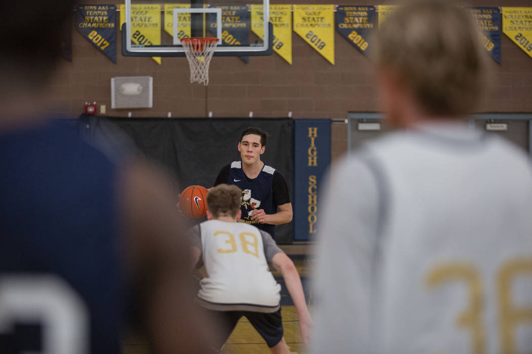 Junior Ethan Speaker (26) leads a drill during practice at Boulder City High School on Wednesda ...