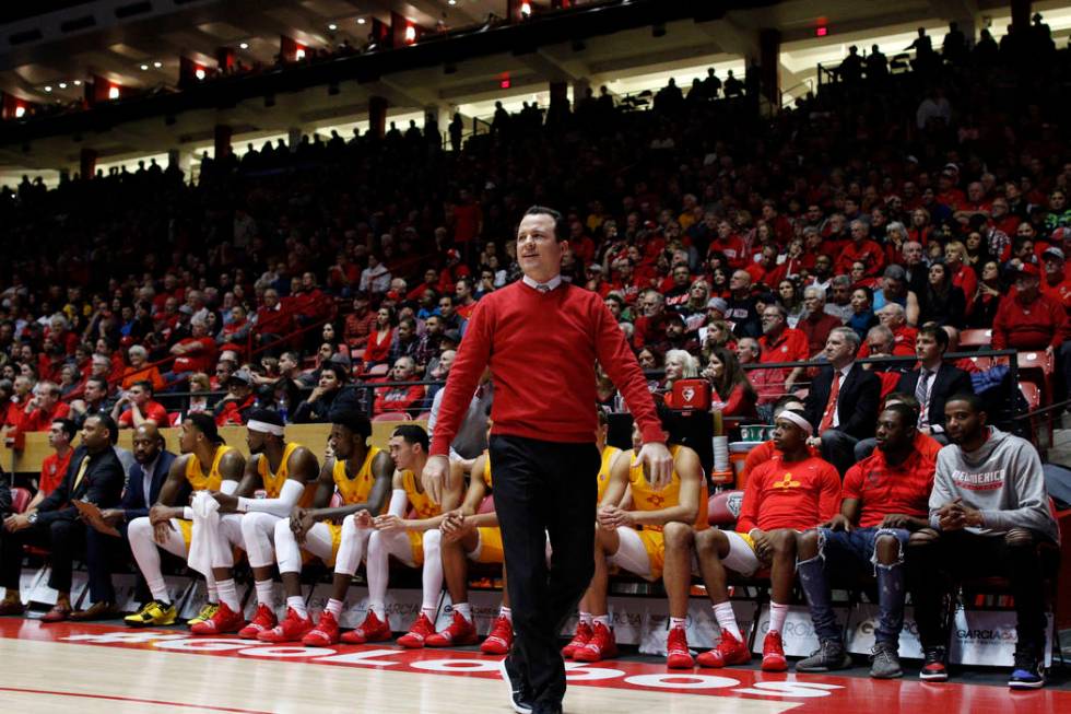 New Mexico head coach Paul Weir walks the sidelines during the first half of an NCAA college ba ...