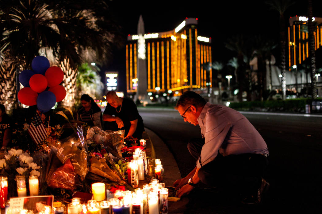 Jim Synder of Las Vegas attends a vigil in remembrance of the mass shooting victims along the S ...