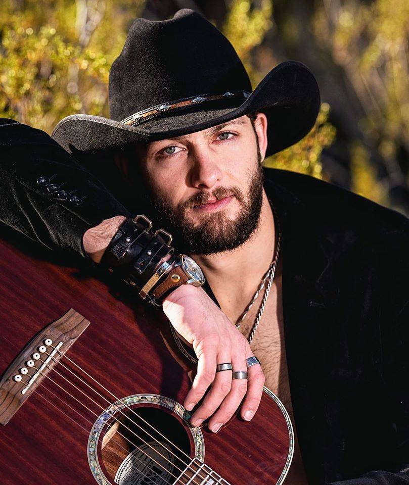 Country singer Dez Hoston takes issue with Eminem's gun control advocacy in his "Darkness" vide ...