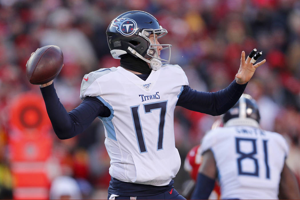 Tennessee Titans' Ryan Tannehill throws during the first half of the NFL AFC Championship footb ...