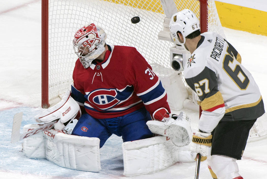 Montreal Canadiens goaltender Carey Price, left, is scored against by Vegas Golden Knights' Rei ...