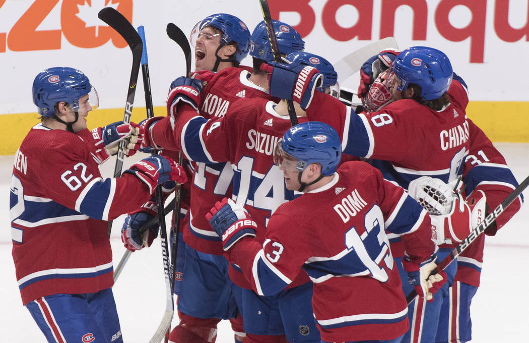 Montreal Canadiens celebrate after defeating the Vegas Golden Knights in an NHL hockey game in ...
