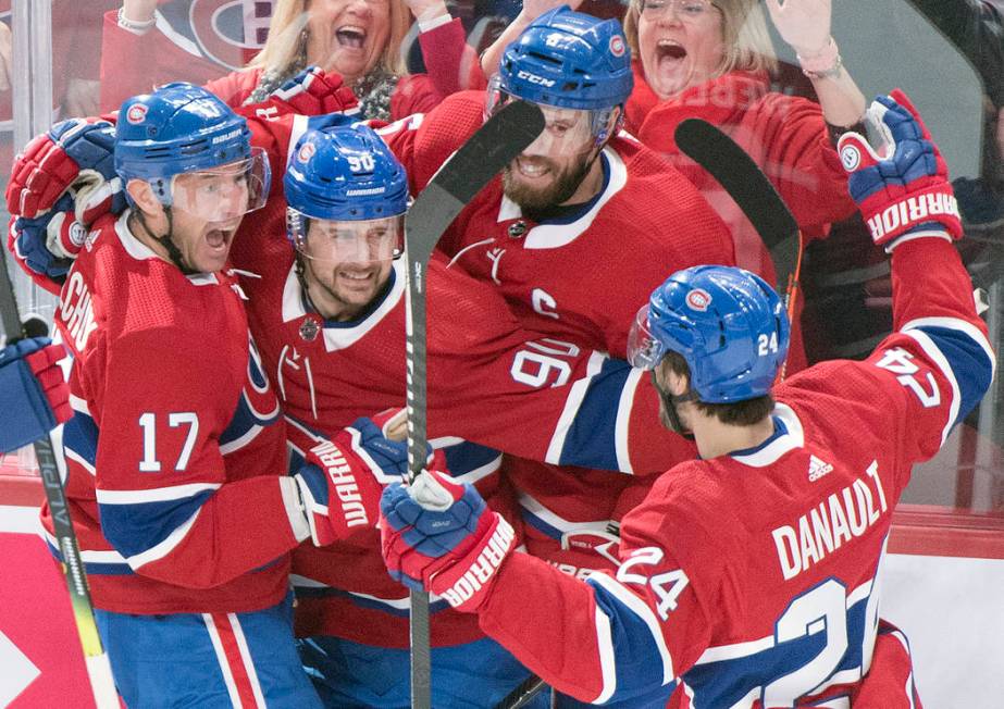 Montreal Canadiens' Ilya Kovalchuk (17) celebrates with teammates Tomas Tatar (90), Shea Weber ...