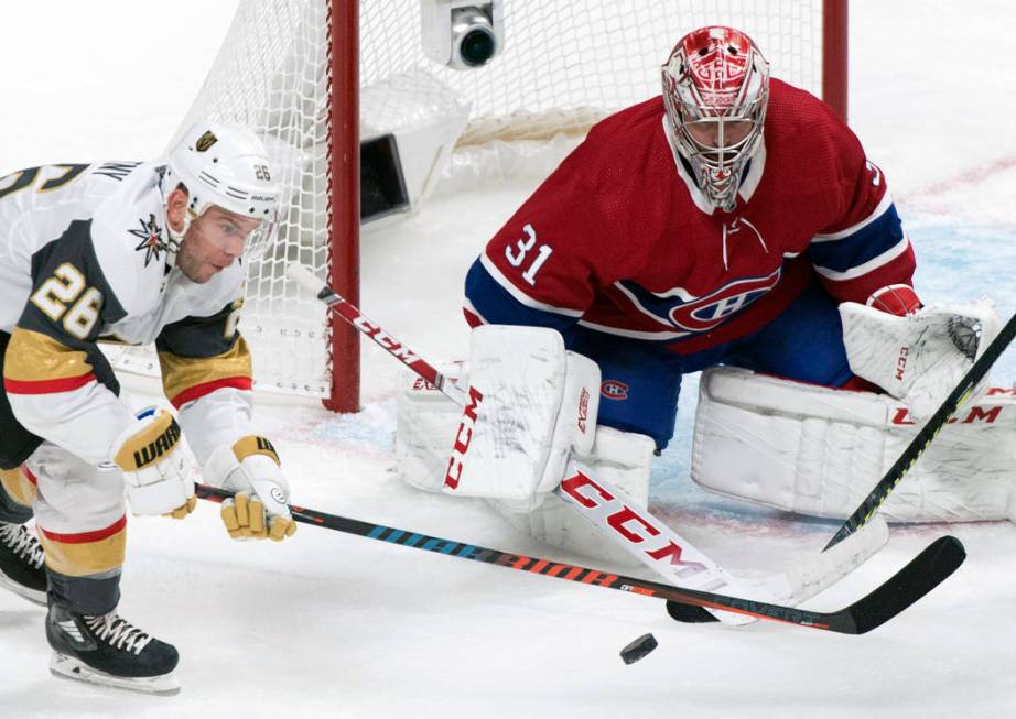 Vegas Golden Knights' Paul Stastny, left, moves in against Montreal Canadiens goaltender Carey ...