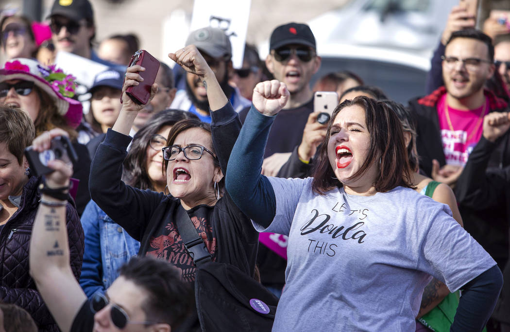 Participants in the Empowering Women March 2020 chant feminist and progressive political stance ...