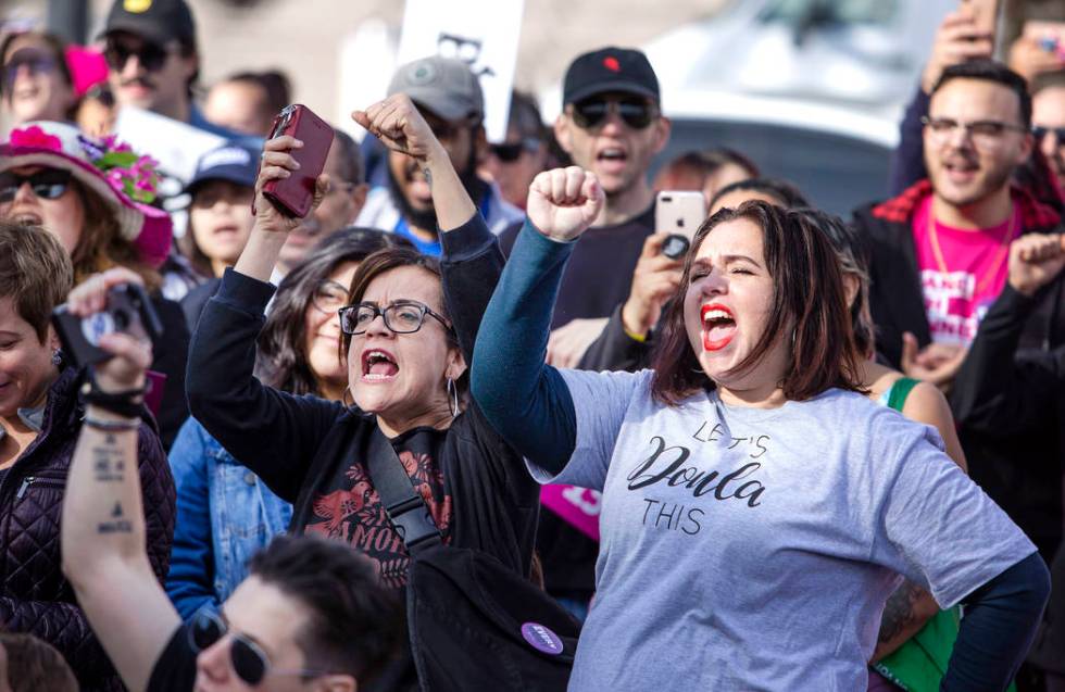 Participants in the Empowering Women March 2020 chant feminist and progressive political stance ...