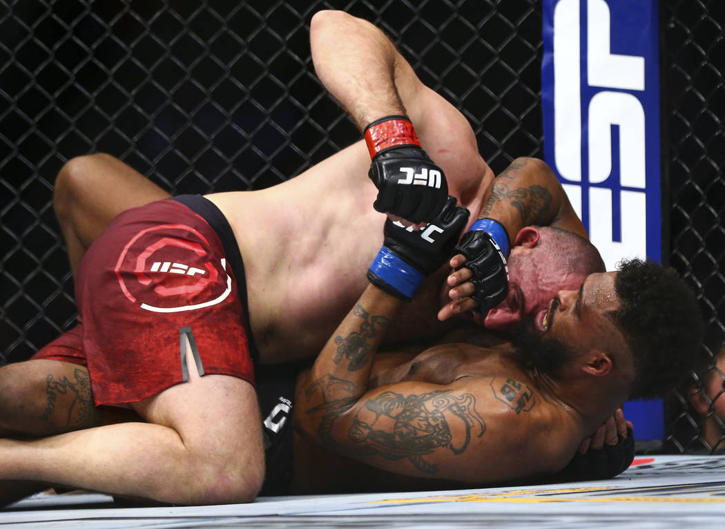 Aleksei Oleinik, above, fights Maurice Greene during their heavyweight bout at UFC 246 at T-Mob ...