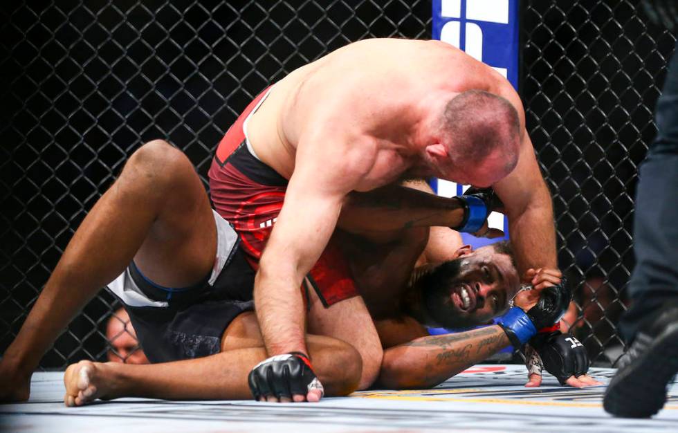 Aleksei Oleinik, above, fights Maurice Greene during their heavyweight bout at UFC 246 at T-Mob ...