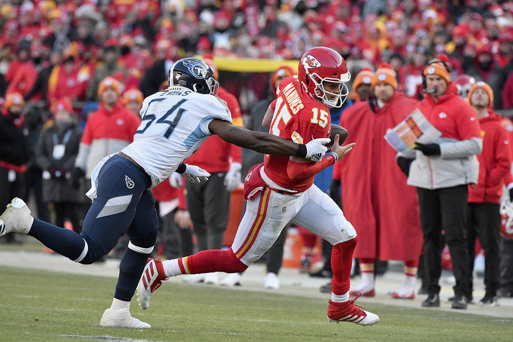 Kansas City Chiefs' Patrick Mahomes runs for a touchdown past Tennessee Titans linebacker Rasha ...