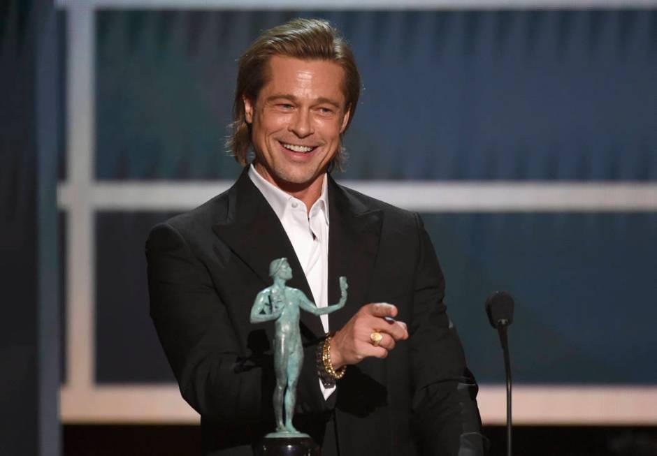 Brad Pitt accepts the award for outstanding performance by a male actor in a supporting role fo ...