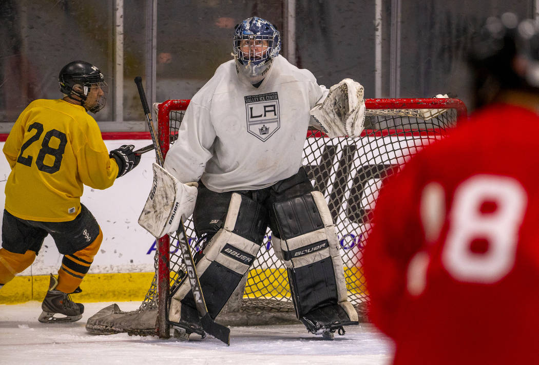 Team Redrum goalie John Hunt looks up the ice while facing the Golden Knights in their semi-fin ...