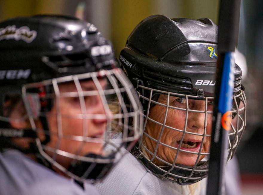 Brynne Van Putten, right, with the Flamingos, talks with other players as they face the Blackja ...