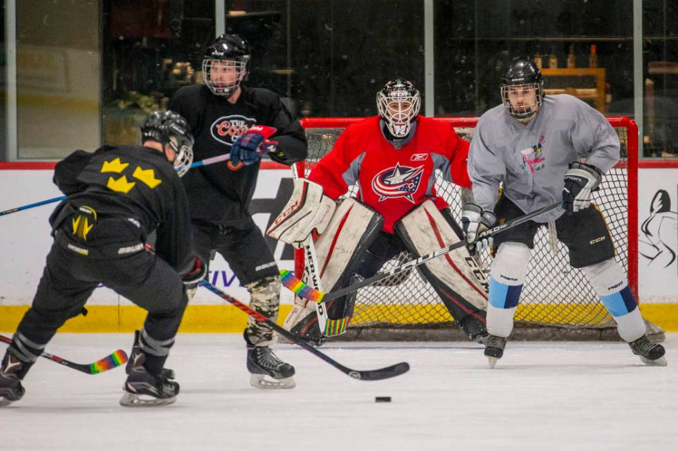 Team Blackjacks drive the puck towards the goal against the Flamingos in their semi-finals game ...