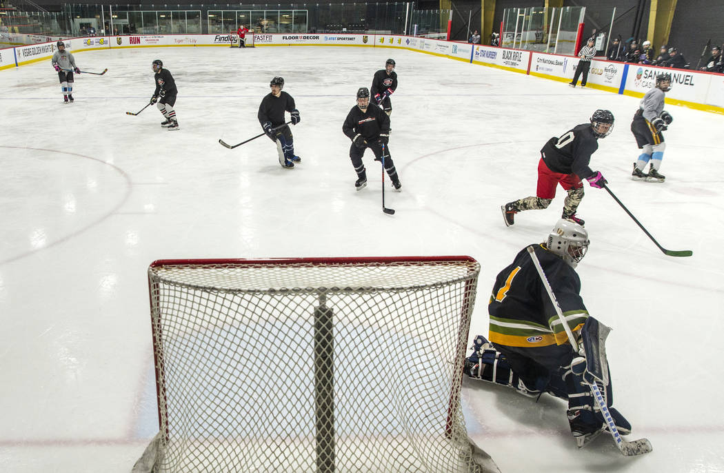 The Blackjacks battle the Flamingos in their semi-finals game during the Sin City Classic hocke ...