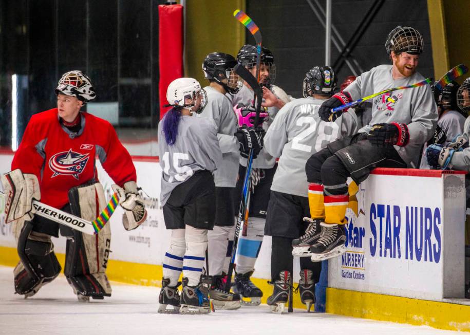 Team Flamingos gather along the bench during a break in the action against the Blackjacks in th ...