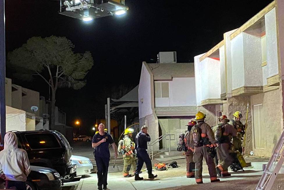 North Las Vegas, Las Vegas and Clark County firefighters at the scene of an apartment fire at 4 ...