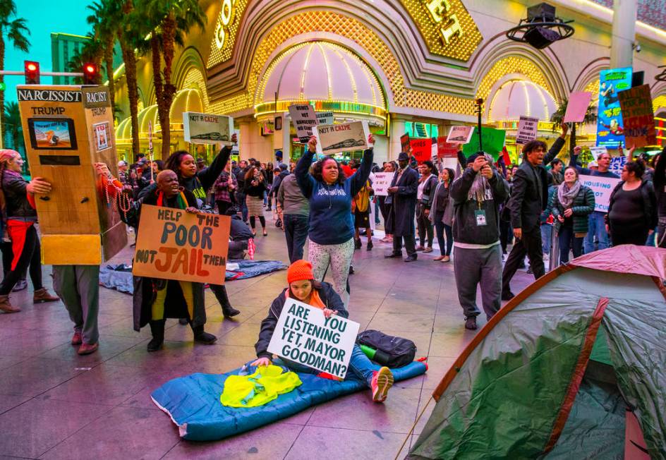 Local activists block Casino Center Blvd. through the Fremont Experience following a rally at t ...